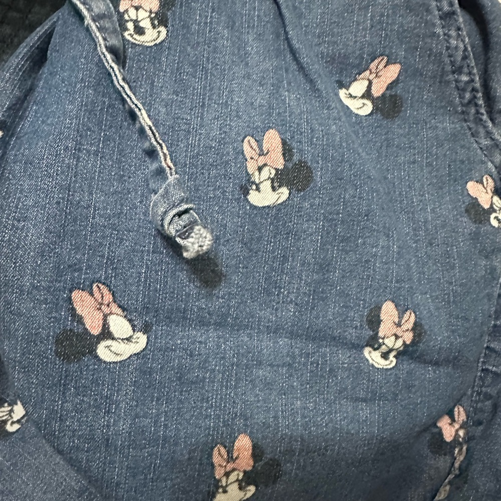 Disney Blue Denim Jeanie’s with Minnie Mouse head all over. Drawstring elastic